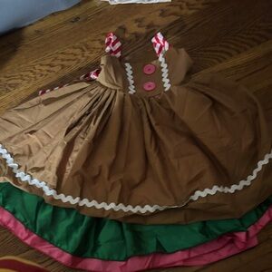Brown Gingerbread-Style Kids Dress with Green & Pink Ruffle Trim